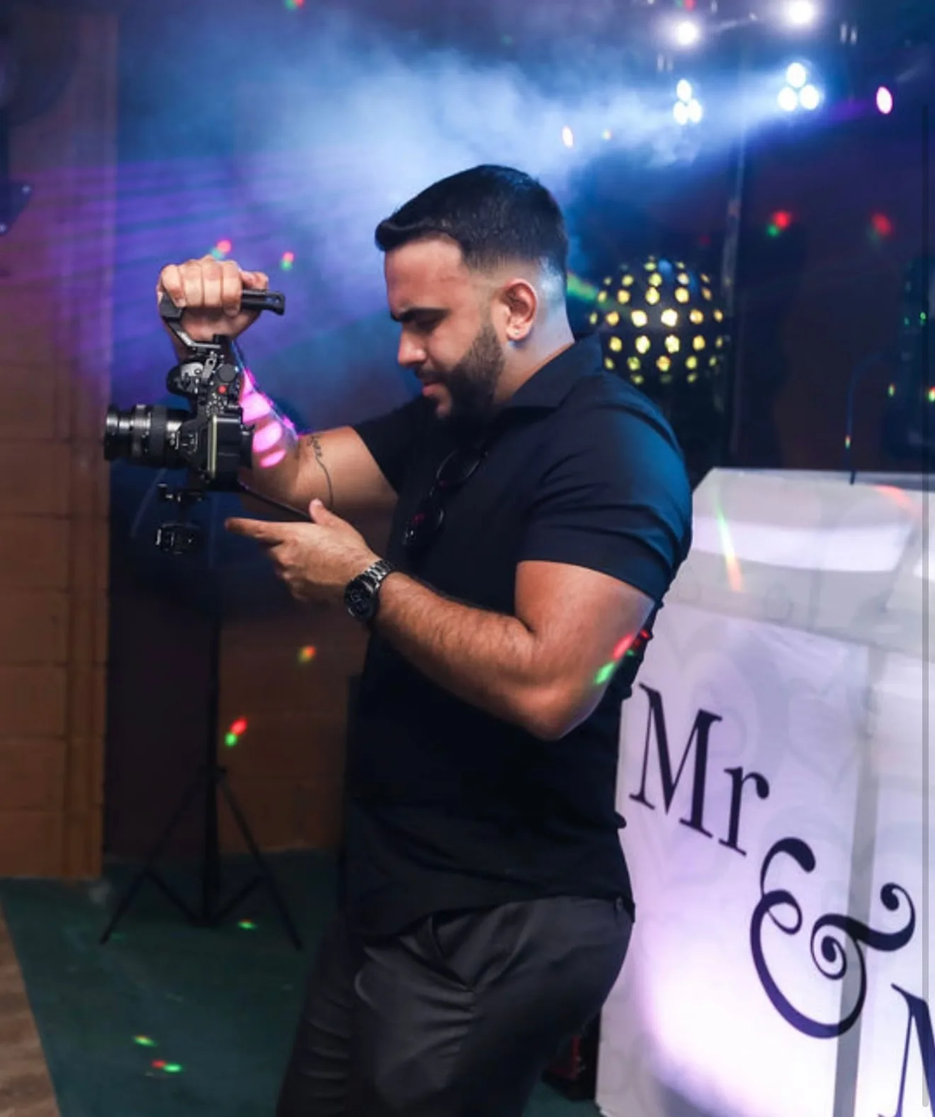 Pedro Villegas, filming a wedding reception
